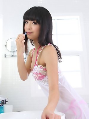 Sakura Sato Asian is sexy even when brushing her hair and teeth